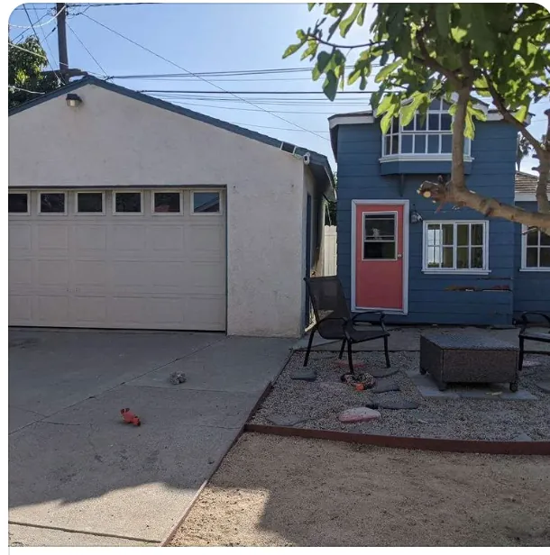 Residential property exterior before demolition and yard cleanup in Santa Fe Springs